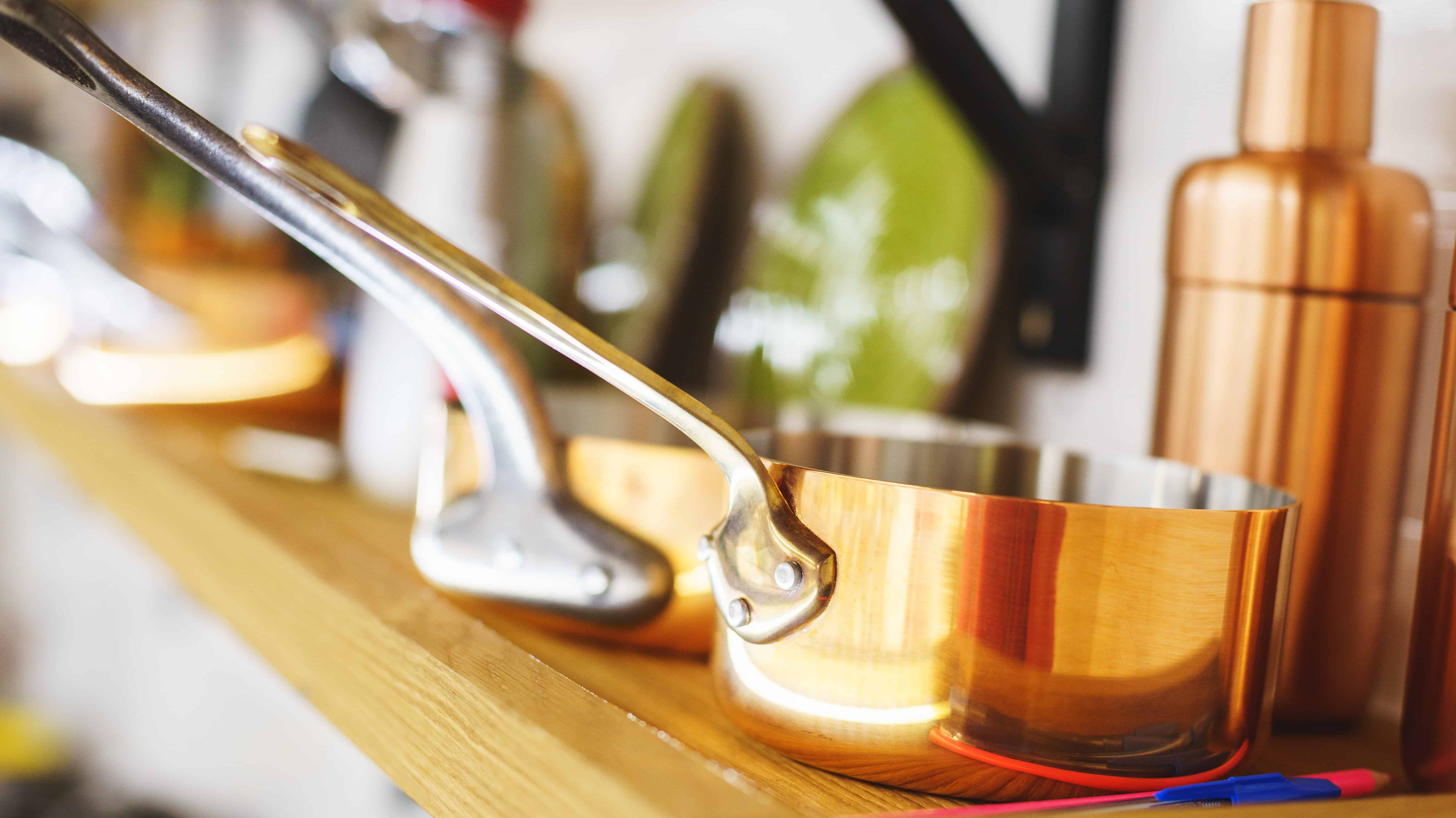 Copper frying pan in kitchen.