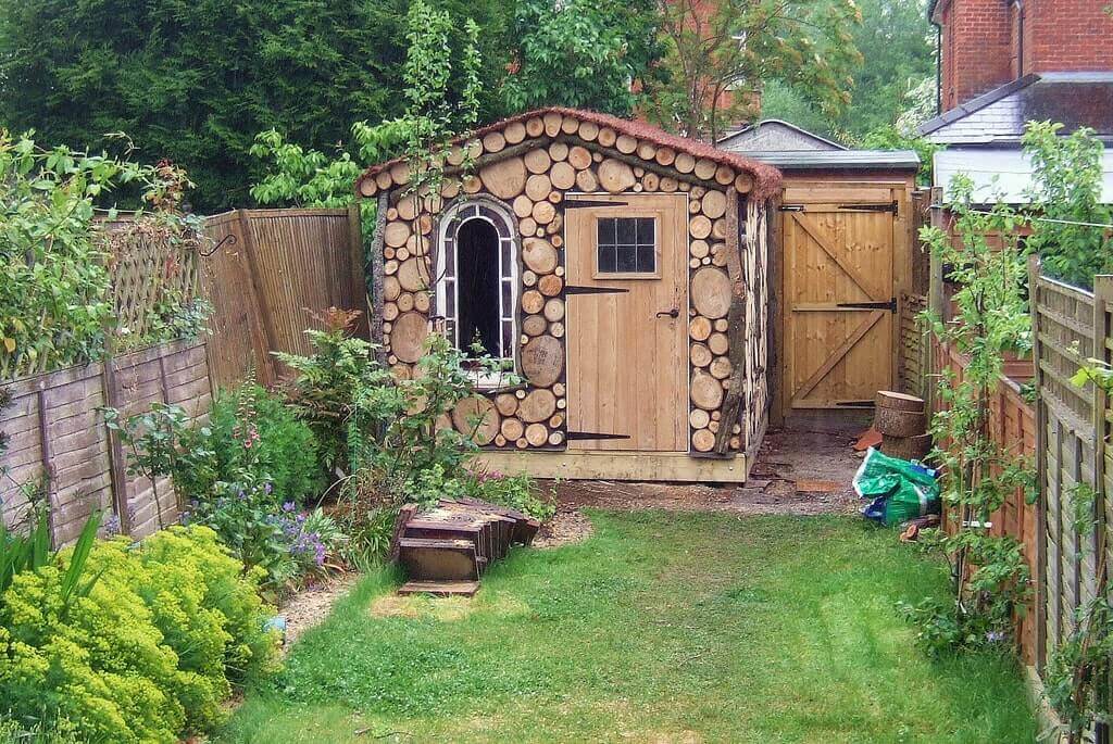 Beautiful log inspired shed.